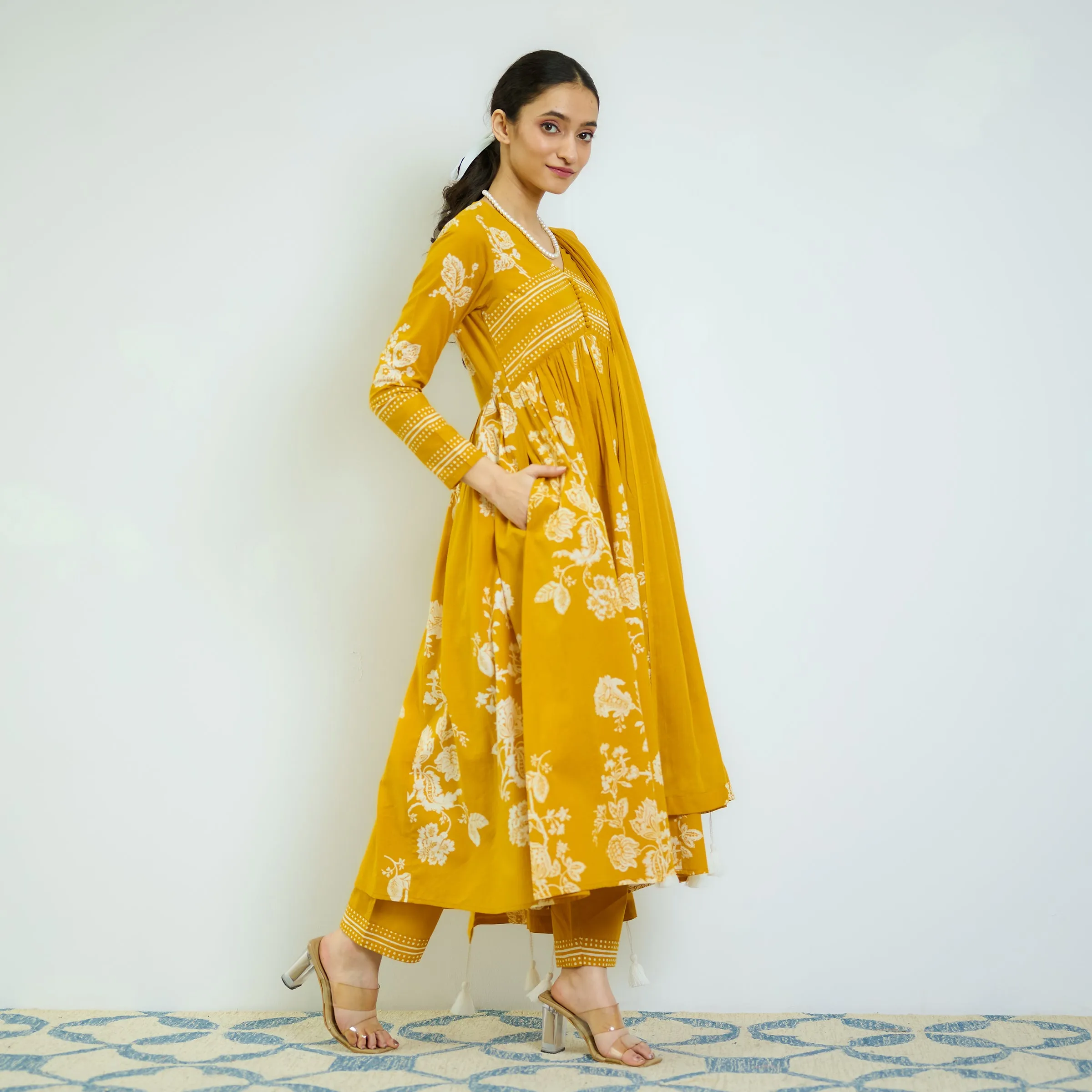 Zehra Yellow Cotton Kurta Set with Mul Cotton Dupatta & Tassel Detail