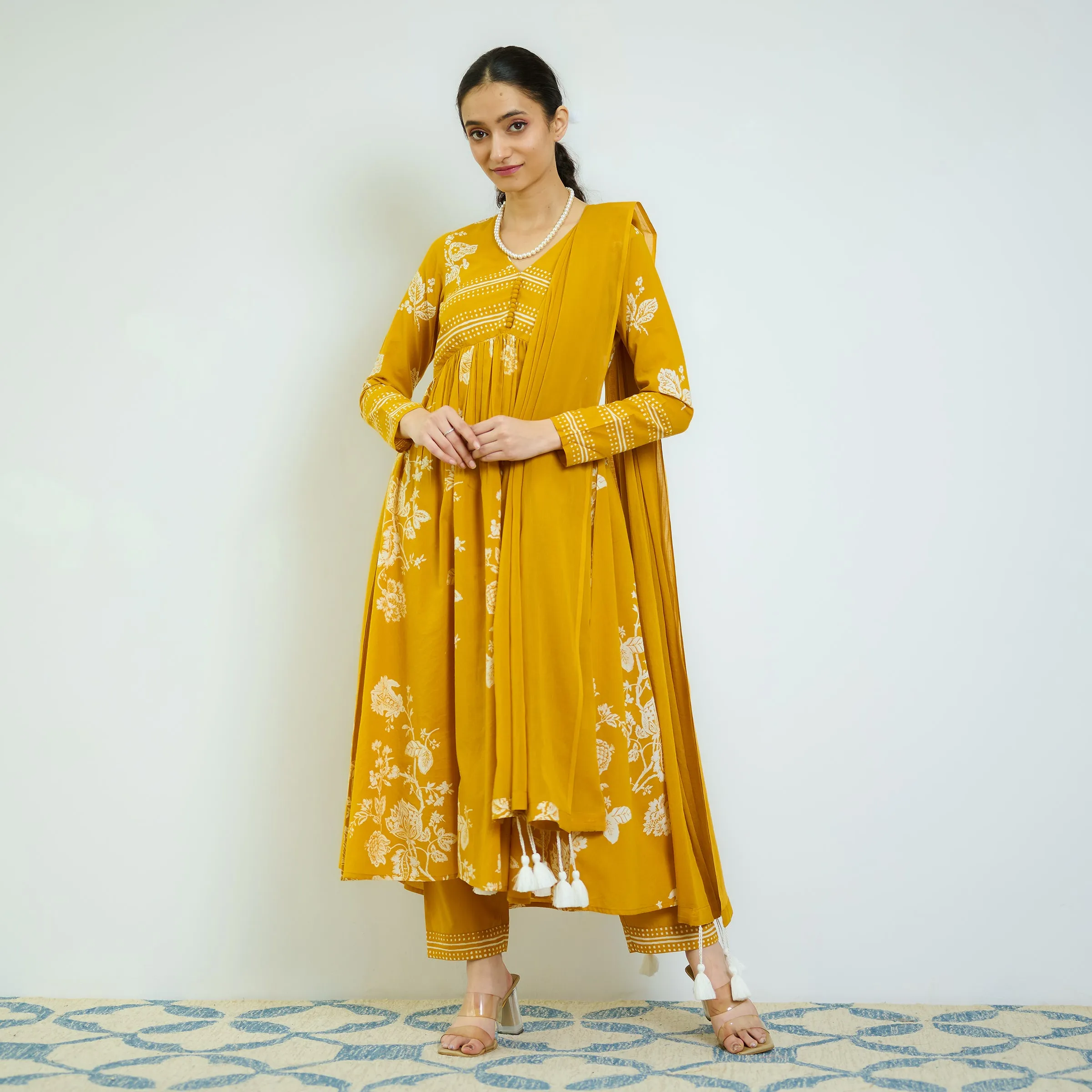 Zehra Yellow Cotton Kurta Set with Mul Cotton Dupatta & Tassel Detail