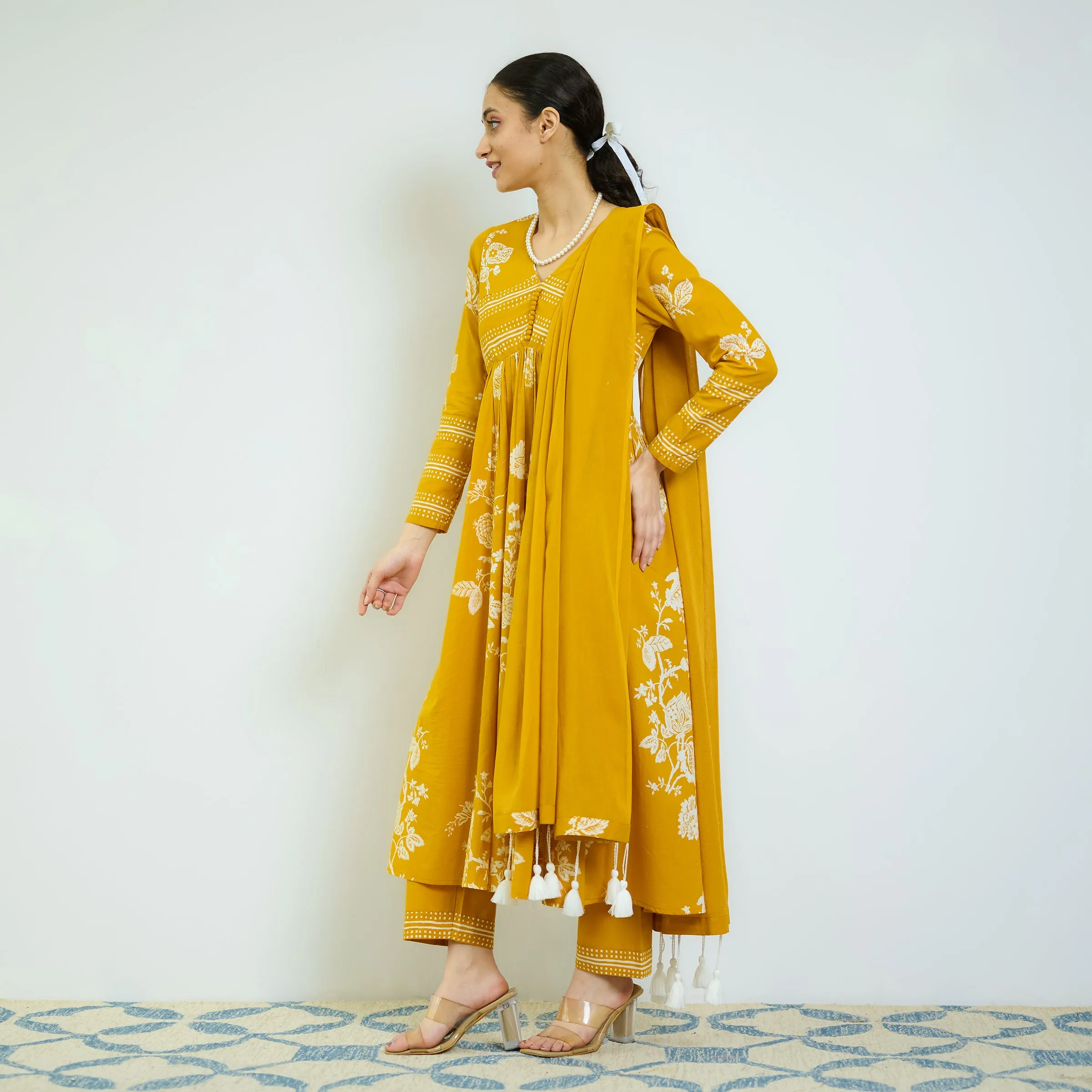 Zehra Yellow Cotton Kurta Set with Mul Cotton Dupatta & Tassel Detail